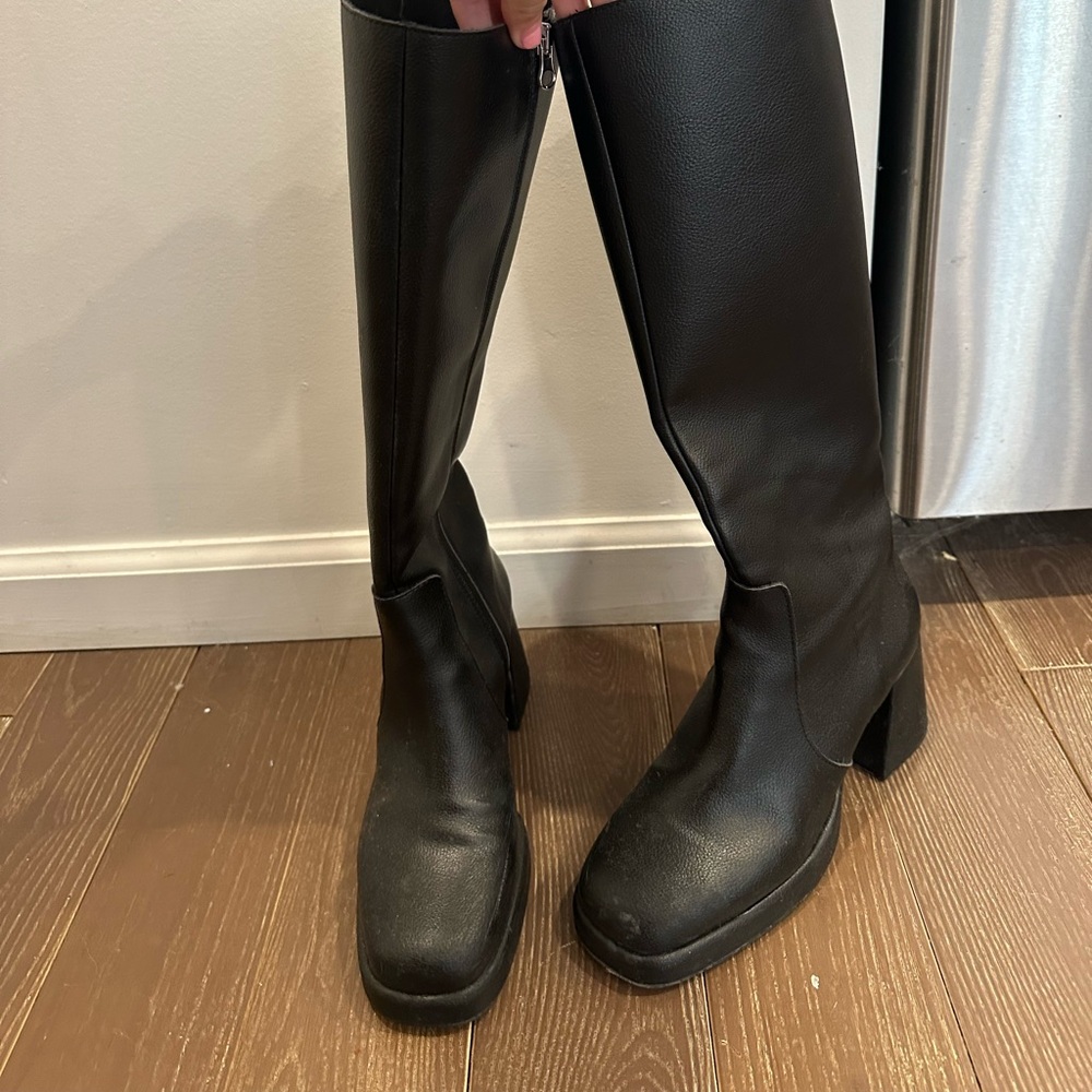 Knee high black boots